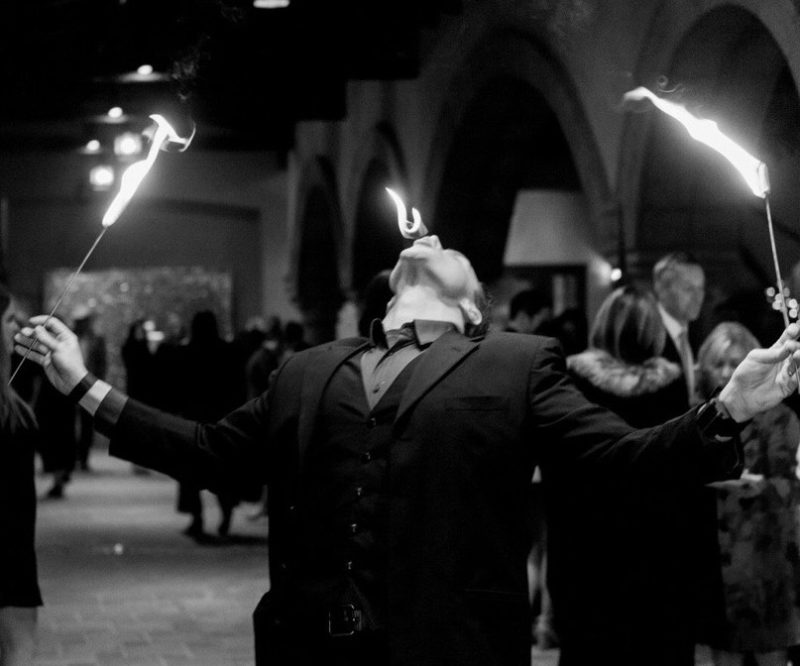 Photo of magician eating fire 